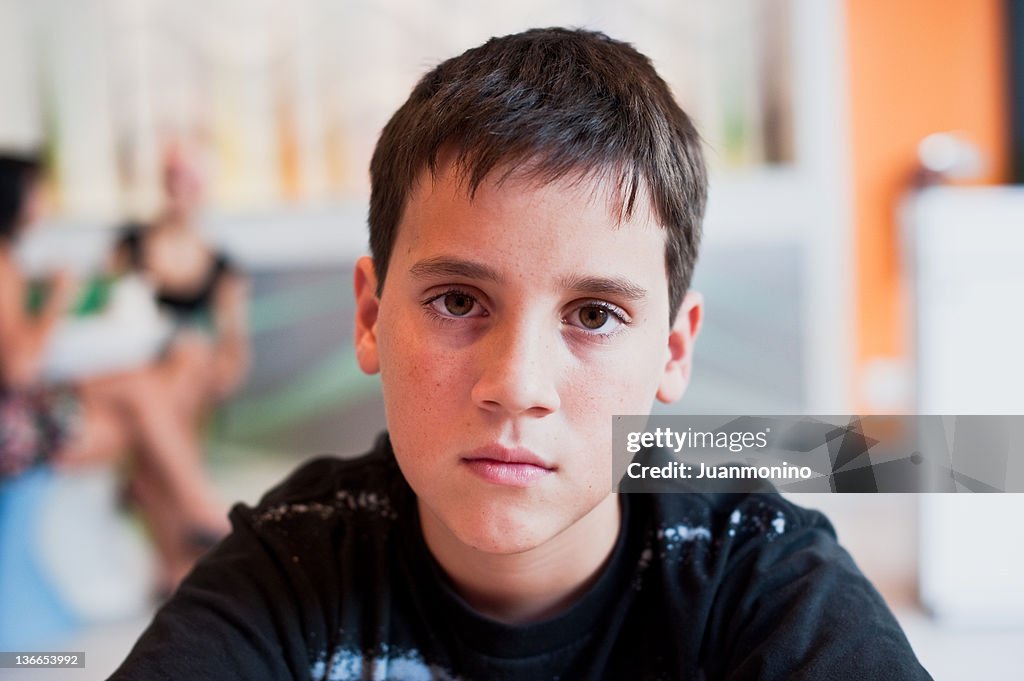 Serious twelve years old boy
