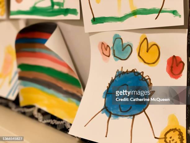 child’s art drawings on display at home - disability collection stock pictures, royalty-free photos & images