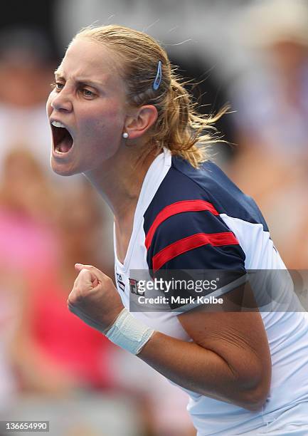 Jelena Dokic of Australia reacts after winning a point in her second round match against Marion Bartoli of France during day three of the 2012 Sydney...
