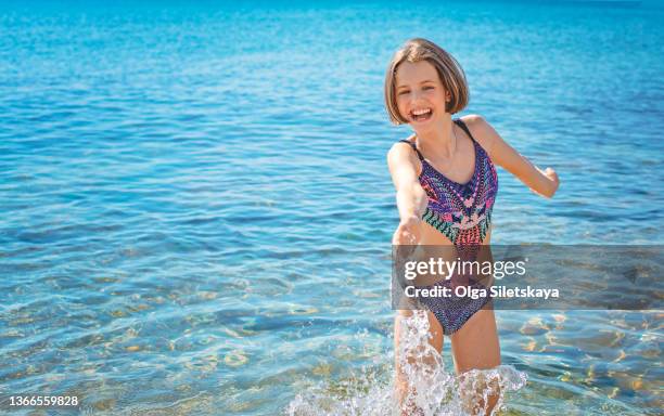 101 photos et images de Teens Bathing Suit - Getty Images