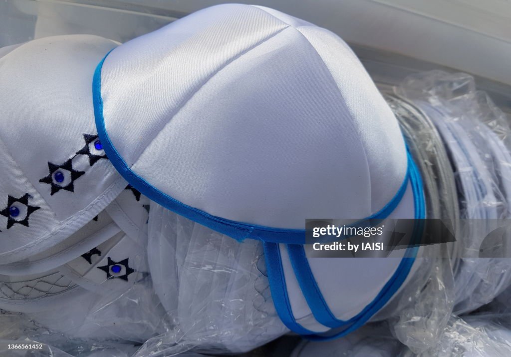 Blue and white kipas / yarmulke at the market