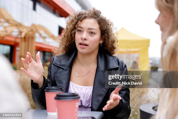 a young business women discussing ideas at a team meeting- new business start up - david swallow stock pictures, royalty-free photos & images