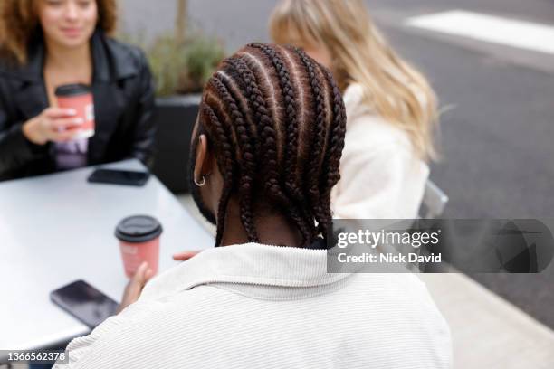 work colleagues discussing ideas - new business start up - cornrows stock pictures, royalty-free photos & images