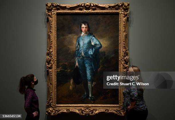 National Gallery staff pose in front of 'The Blue Boy' by Thomas Gainsborough at the National Gallery on January 24, 2022 in London, England. The...