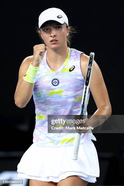 Iga Swiatek of Poland celebrates after winning a point in her fourth round singles match against Sorana Cirstea of Romania during day eight of the...