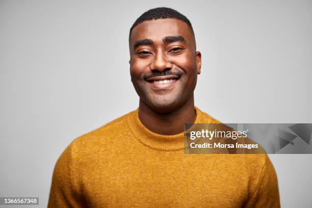 smiling african american male entrepreneur on white background - portrait white background male foto e immagini stock