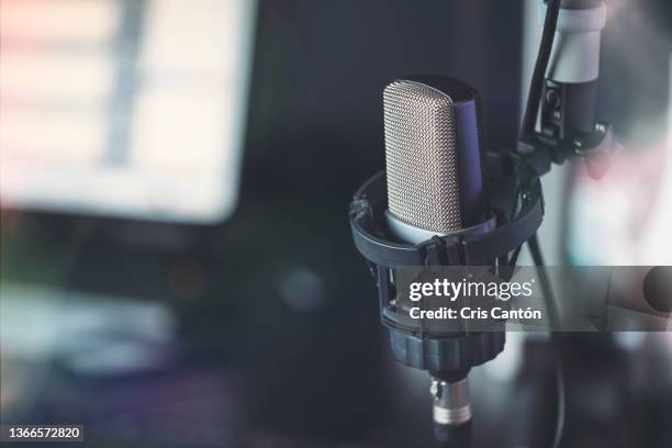 close up of microphone in radio broadcast studio - microfoon stockfoto's en -beelden