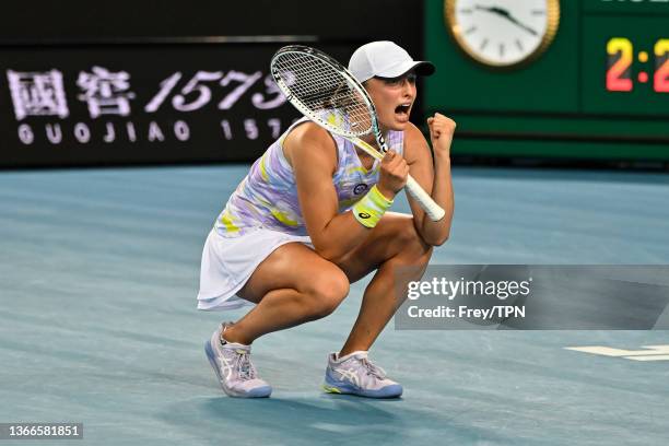 Iga Swiatek of Poland celebrates her victory over Sorana Cirstea of Romania during day eight of the 2022 Australian Open at Melbourne Park on January...