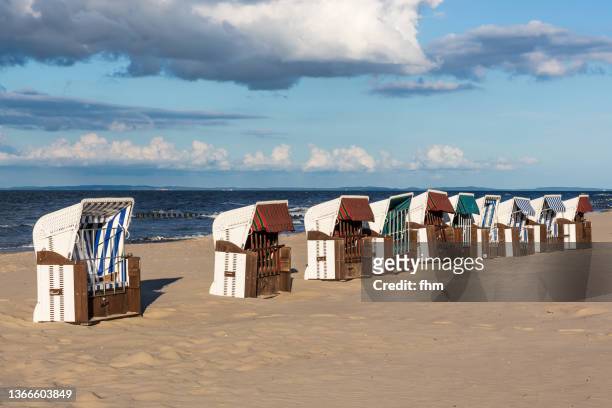 many beach chair on the beach - strandkorb stockfoto's en -beelden