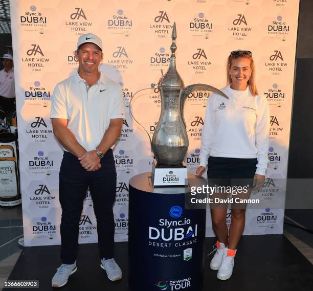 Paul Casey of England the winner of the JA Bibe Roof Top Bar Challenge at The JA Lake View Hotel poses for a photograph with Ladies European Tour...