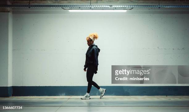 afro-american woman training - evening walk stock pictures, royalty-free photos & images