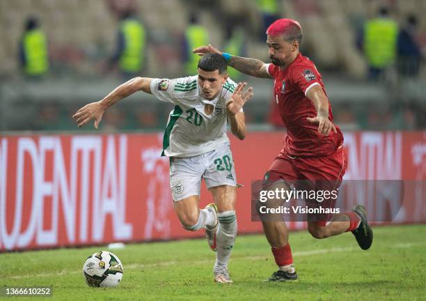 Of Algeria and IBAN SALVADOR of Equatorial Guinea during the Group E Africa Cup of Nations 2021 match between Algeria and Equatorial Guinea at Stade...