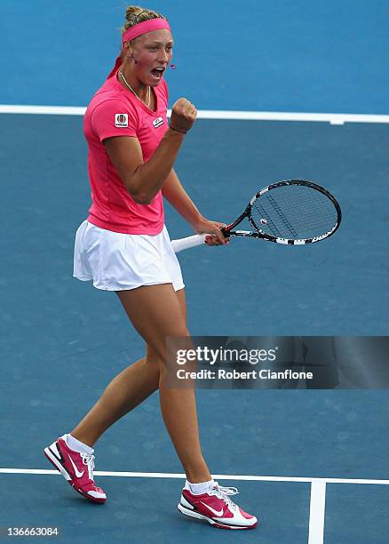 Yanina Wickmayer of Belgium celebrates a point against Casey Dellacqua of Australia during day three of the 2012 Hobart International at Domain...