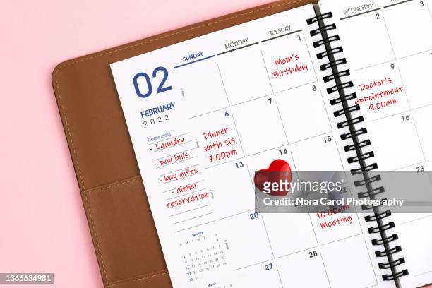february planner with reminders and to do list - annual calendar stock pictures, royalty-free photos & images