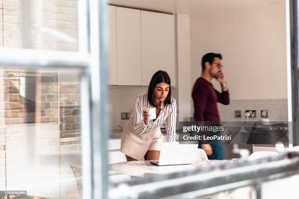Couple freelance work at home in early morning