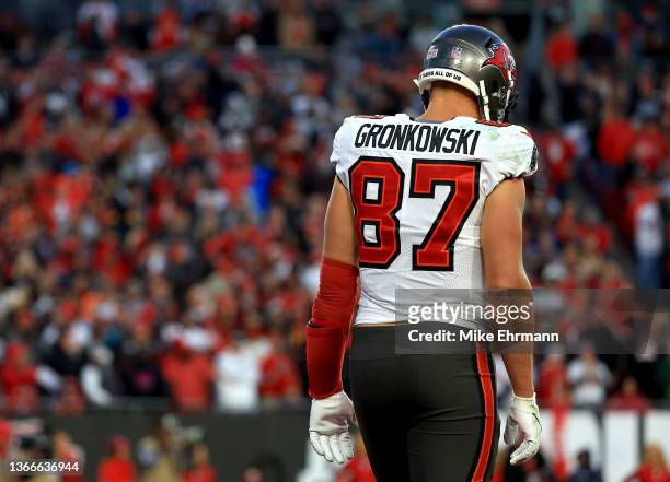 Rob Gronkowski of the Tampa Bay Buccaneers looks on against the Los Angeles Rams in the NFC Divisional Playoff game at Raymond James Stadium on...