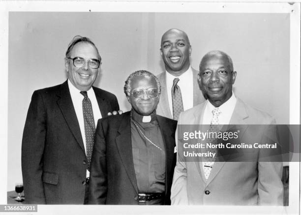 Honorary degree holders Bishop Desmond Tutu, Geoffrey Holder and Chancellor Walker pose