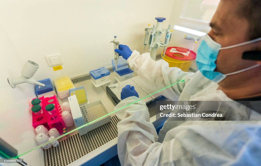 Chemical analysis in Lab, research and testing of the new coronavirus variant, omicron.