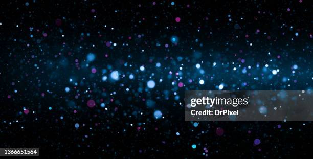 defocused blue lights abstract background - blue confetti stockfoto's en -beelden