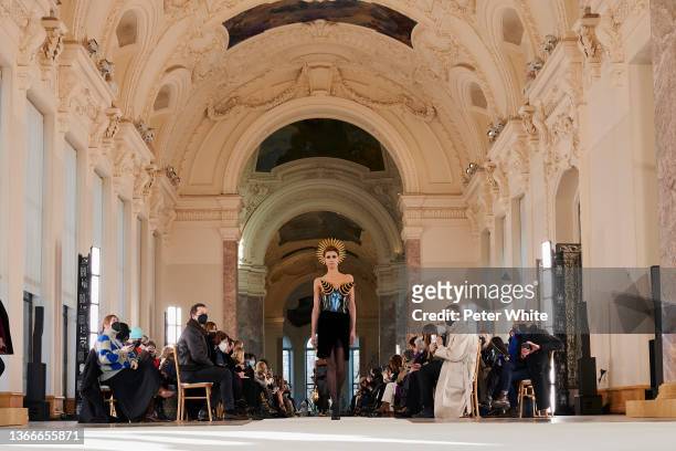 Dilone walks the runway during the Schiaparelli Haute Couture Spring/Summer 2022 show as part of Paris Fashion Week on January 24, 2022 in Paris,...