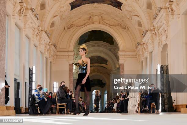 Dilone walks the runway during the Schiaparelli Haute Couture Spring/Summer 2022 show as part of Paris Fashion Week on January 24, 2022 in Paris,...