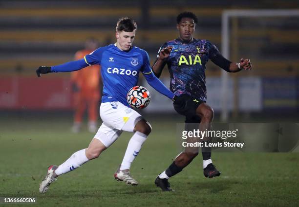 Rhys Hughes of Everton is challenged by Malachi Fagan-Walcott of Tottenham Hotspur during the Premier League 2 match between Everton U23 and...