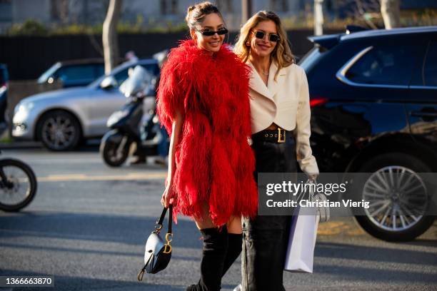 Patricia Gloria Contreras is seen wearing red faux fur coat outside Dior during Paris Fashion Week - Haute Couture Spring/Summer 2022 on January 24,...