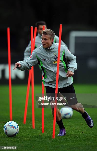 Alexander Ring runs with the ball during a training session at day six of Borussia Moenchengladbach training camp on January 10, 2012 in Belek,...