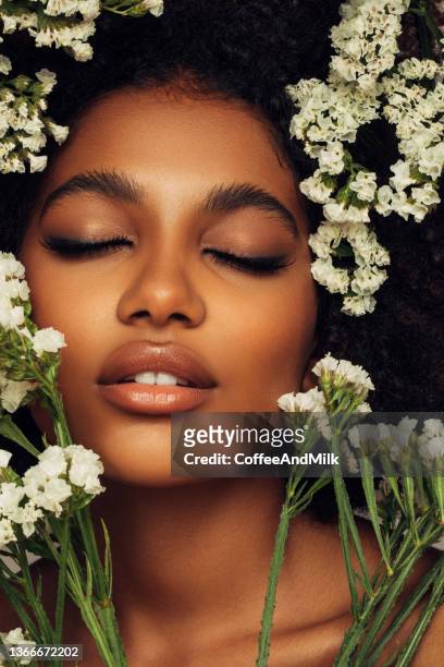 young beautiful girl with wreath of flowers on her head - ceremonial make up stock pictures, royalty-free photos & images