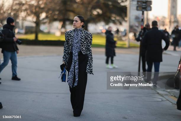 Fashion week guest is seen outside Schiaparelli during Paris Fashion Week Haute Couture Spring/Summer 2022 on January 24, 2022 in Paris, France.