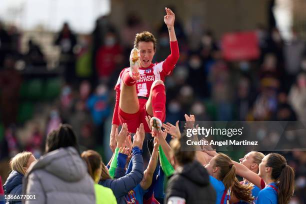 Virginia Torrecilla of Atletico de Madrid is thrown in the air by Barcelona players after the Supercopa de Espana Femenina Final match between FC...