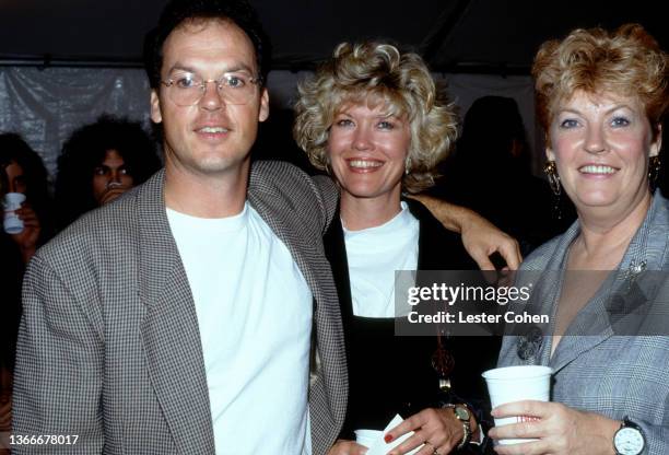 American actor Michael Keaton and wife American actress Caroline McWilliams attend the Rolling Stones concert during the 1989 Steel Wheels tour at...