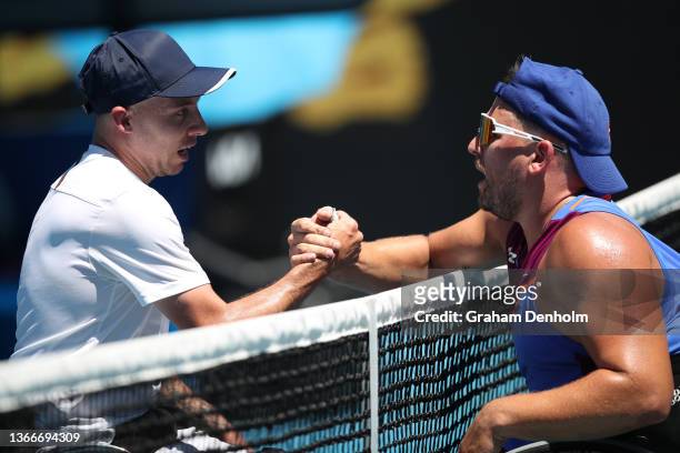 Dylan Alcott of Australia shakes hands with Andy Lapthorne of Great Britain after winning in his Men's Quad Wheelchair Singles Semifinals match...