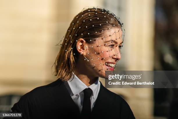 Rosamund Pike is seen, outside Dior, during Paris Fashion Week - Haute Couture Spring/Summer 2022, on January 24, 2022 in Paris, France.