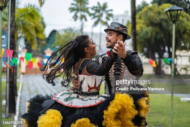 dancers dancing gang at festa junina - square dancing stock pictures, royalty-free photos & images