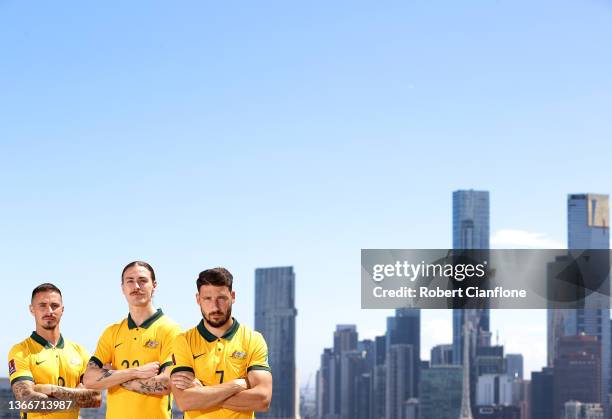 Jamie Mclaren, Jackson Irvine and Mathew Leckie of Australia pose during an Australian Socceroos media opportunity at The Pullman Hotel on January...