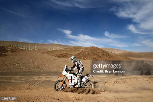Gilles Diguiet of France and Evette-Dakar rides his KTM on stage eight of the 2012 Dakar Rally from Copiapo to Antofagasta on January 9, 2012 in...