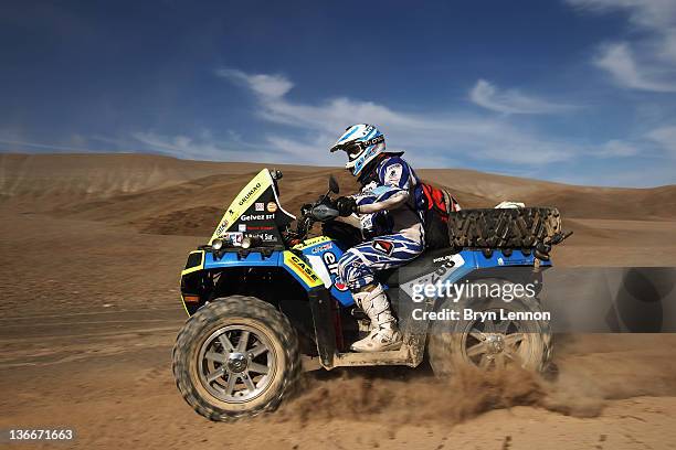 Federico Gut of Argentina and Polaris Argentina rides his Polaris quad on stage eight of the 2012 Dakar Rally from Copiapo to Antofagasta on January...