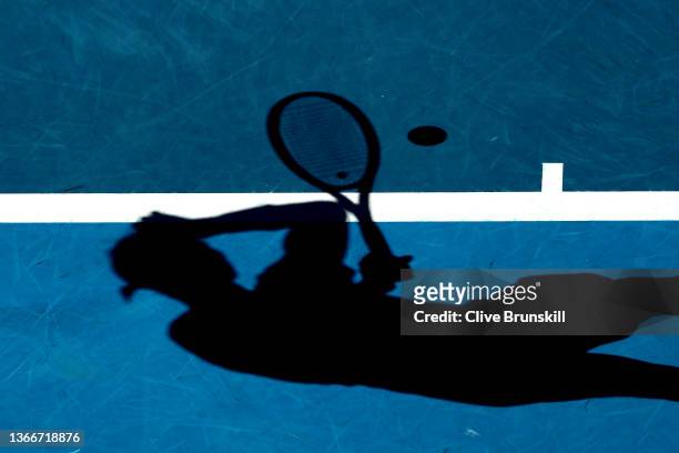 Rafael Nadal of Spain prepares to serve in his Men's Singles Quarterfinals match against Denis Shapovalov of Canada during day nine of the 2022...