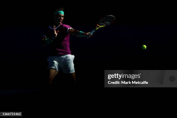 Rafael Nadal of Spain plays a forehand in his Men's Singles Quarterfinals match against Denis Shapovalov of Canada during day nine of the 2022...