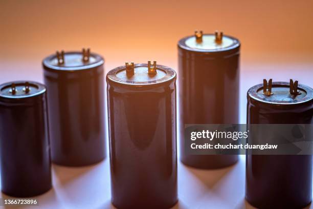 electrolytic capacitors - capacitors stock pictures, royalty-free photos & images