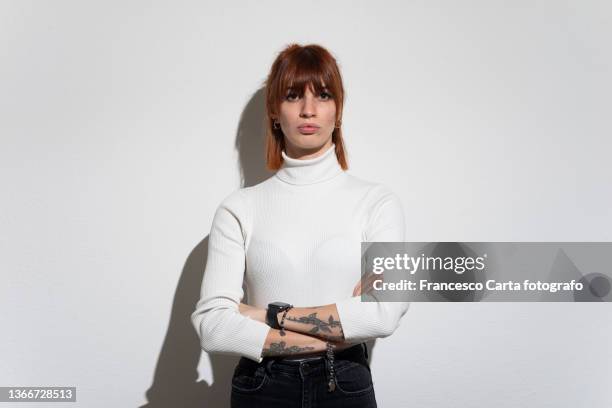 portrait of young woman - white studio stock pictures, royalty-free photos & images