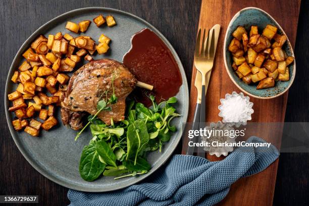 confit de canard - braised stock pictures, royalty-free photos & images
