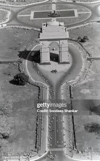 Aerial view of The India Gate a war memorial located on the Rajpath of New Delhi. It stands as a memorial to 90,000 soldiers of the British Indian...