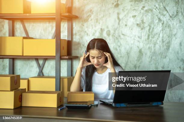 asian business owner woman annoyed customer and working with boring emotion,online selling. - system failure stock pictures, royalty-free photos & images