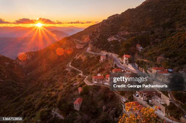 bright clouds over a mountain during sunset - arcadia greece stock pictures, royalty-free photos & images