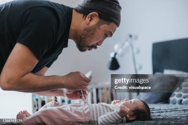 father and daughter spending time together at home - parental leave stock pictures, royalty-free photos & images