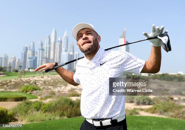 Footballer Alex Oxlade-Chamberlain of England and Liverpool plays in the pro am ahead of the Slync.io Dubai Desert Classic at Emirates Golf Club on...