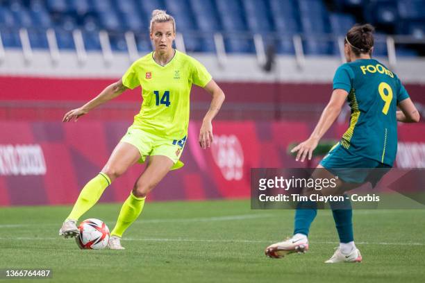 Nathalie Bjorn of Sweden defended by Caitlin Foord of Australia during the Sweden V Australia group G match at Saitama Stadium at the Tokyo 2020...