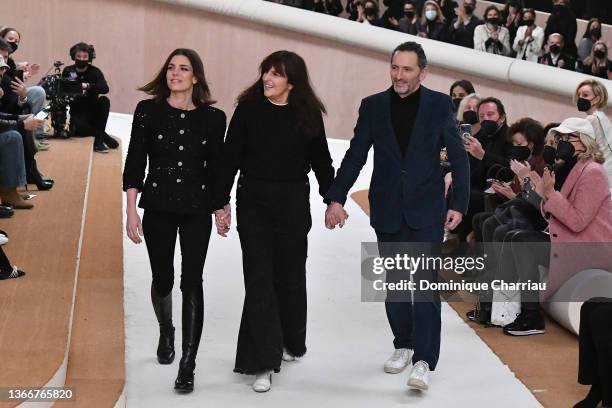 Charlotte Casiraghi, Virginie Viard and Xavier Veilhan walk the runway during the Chanel Haute Couture Spring/Summer 2022 show as part of Paris...